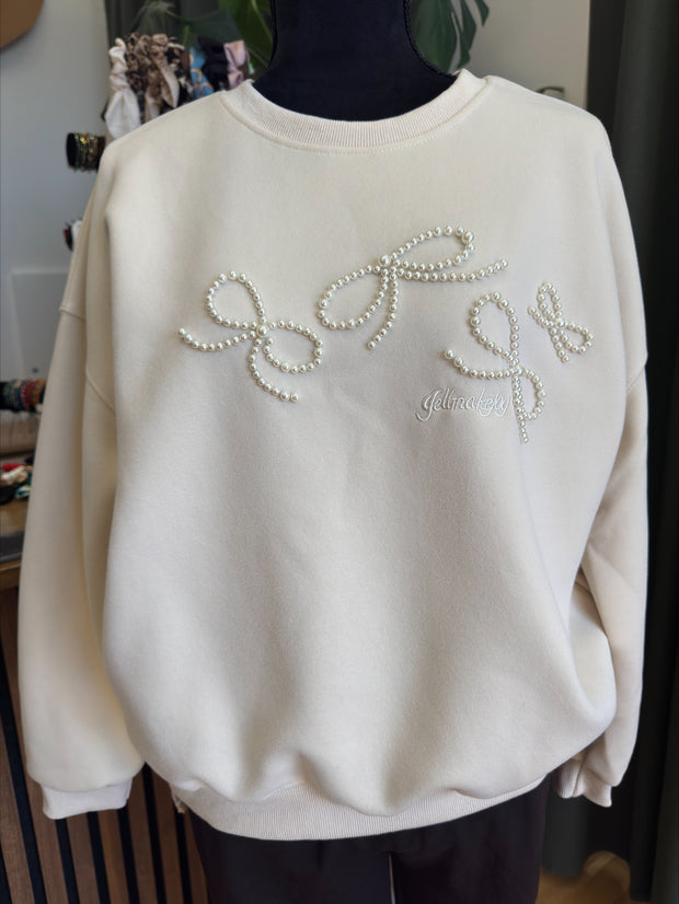 Sweatshirt med pärldetaljer